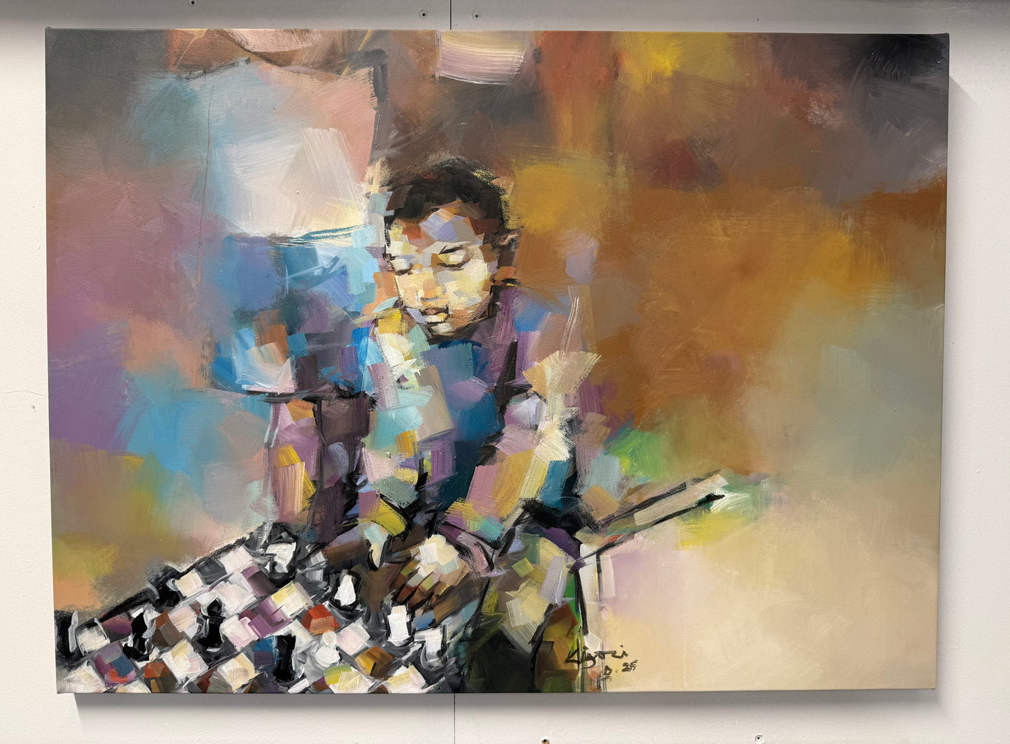 A boy playing chess.